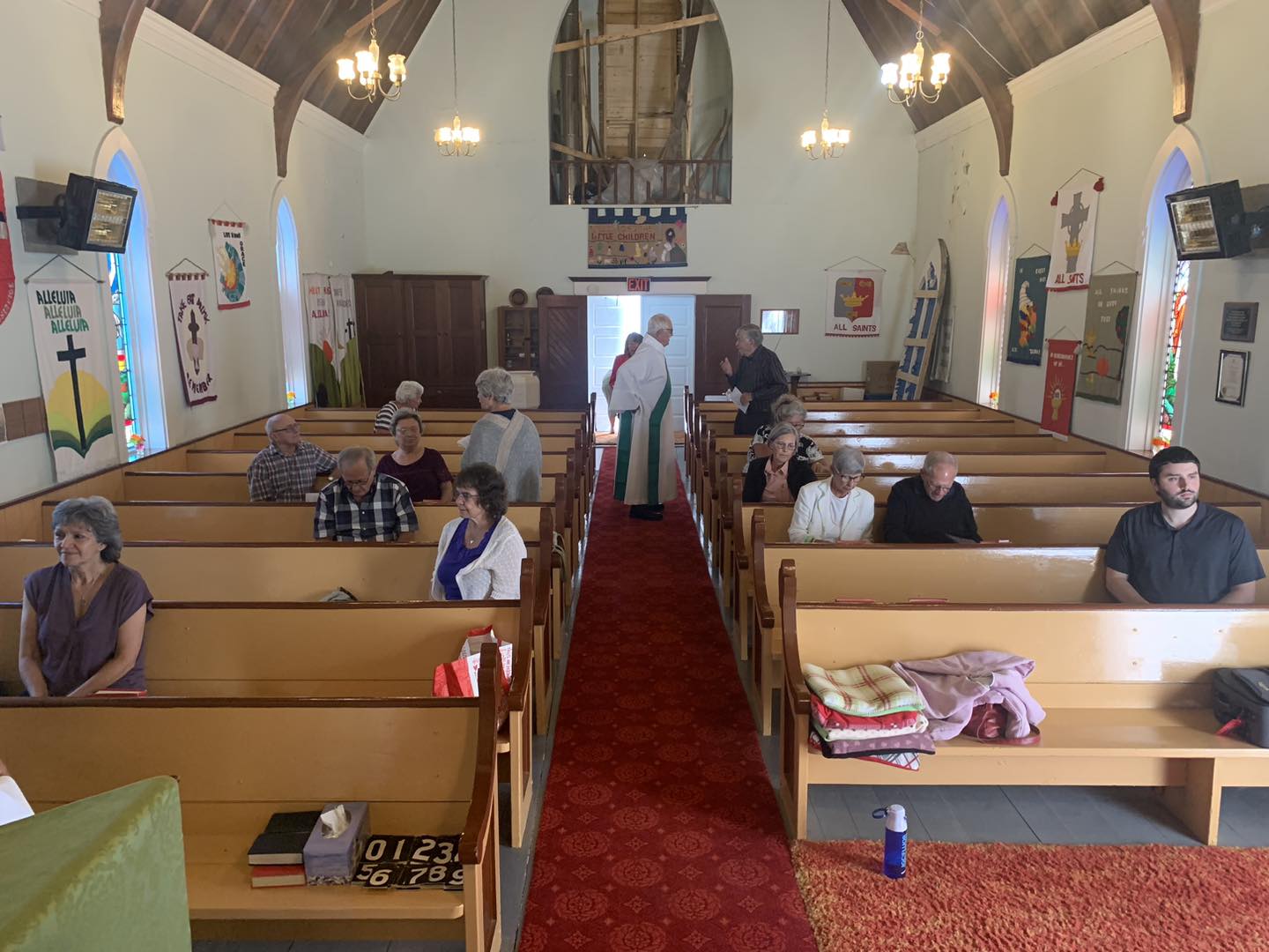 On Sunday, August 18, a Parish service was held at St. Mark's in Mill Cove. We had a lovely service led by Rev. Ann Turner and assisted by Rev. Jerry Cavanaugh and Clair MacInnis. Vases of nasturtiums were placed on the window sills of each stained-glass window in the nave of the church in memory of Joanne Eldershaw's mother, Mabel Johnson. Nasturtiums were Mabel's favourite flower.